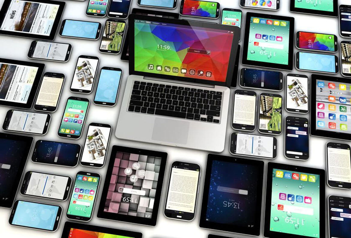 penetration testing services images laptops, tablets and phones all placed neatly around one another